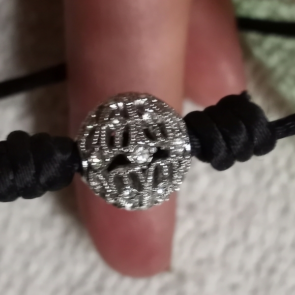 Vintage Jewelry - Silvertone Crystal Ball on black silk cord bracelet